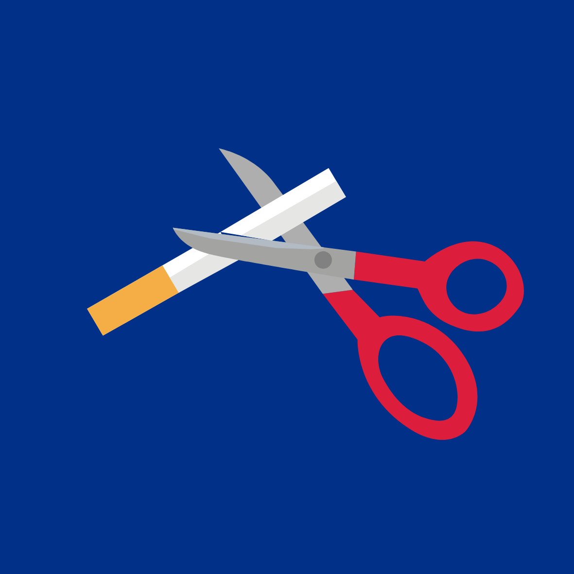 Scissors cutting a cigarette in half